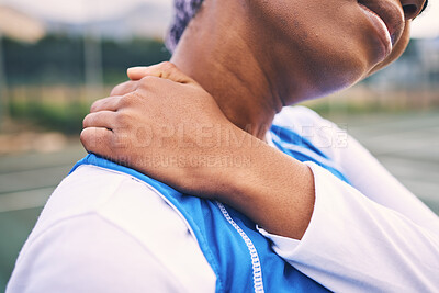 Buy stock photo Neck pain, sport injury and netball athlete on a outdoor sports court with joint or muscle problem. Training, exercise and black woman hands holding body with wellness issue from game workout