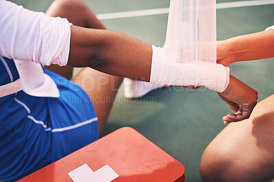 Buy stock photo Sport injury, bandage and first aid with wrist pain and help, health and medic, accident and people on netball court. Medical emergency, train and sports, fitness and arm, anatomy and muscle sprain