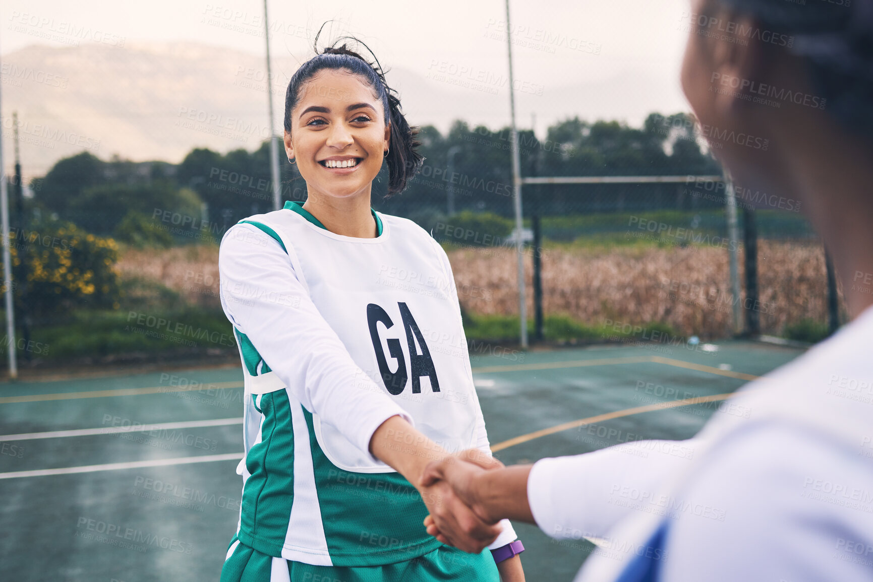 Buy stock photo Woman, sports and smile for handshake, partnership or friends in fun game on the court together. Happy sporty female shaking hands with competitor or player for training match, fitness or workout