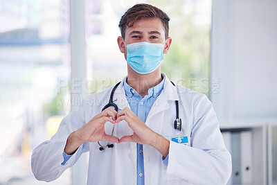 Buy stock photo Covid, portrait and doctor with hand heart sign at hospital for healthcare, innovation and symbol of trust. Emoji, hands and face of cardiovascular surgeon with mask for corona compliance at a clinic