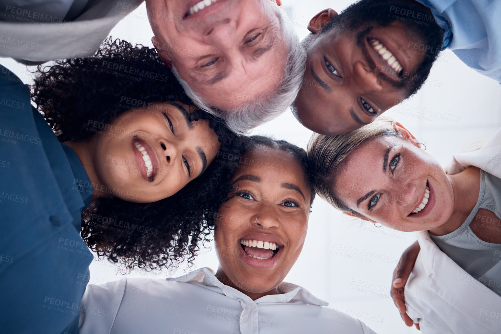 Buy stock photo Portrait, below and happy business people in group or circle for teamwork, team building and collaboration. Face of diversity employees, worker and professional community smile together in solidarity