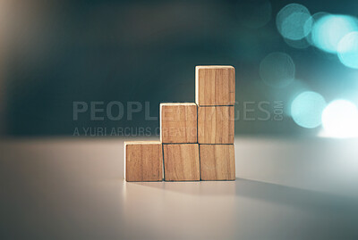 Buy stock photo Building, investment and blocks for business, planning and strategy with stable foundation on a table. Growth, creative and conceptual design for economy, value and finance interest on a desk