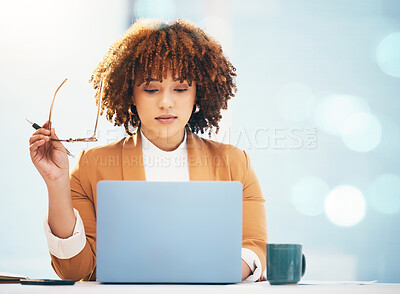 Buy stock photo Black woman, business and laptop with glasses reading email and working online in office. Entrepreneur person at desk with technology and bokeh mockup space for career research and data analysis