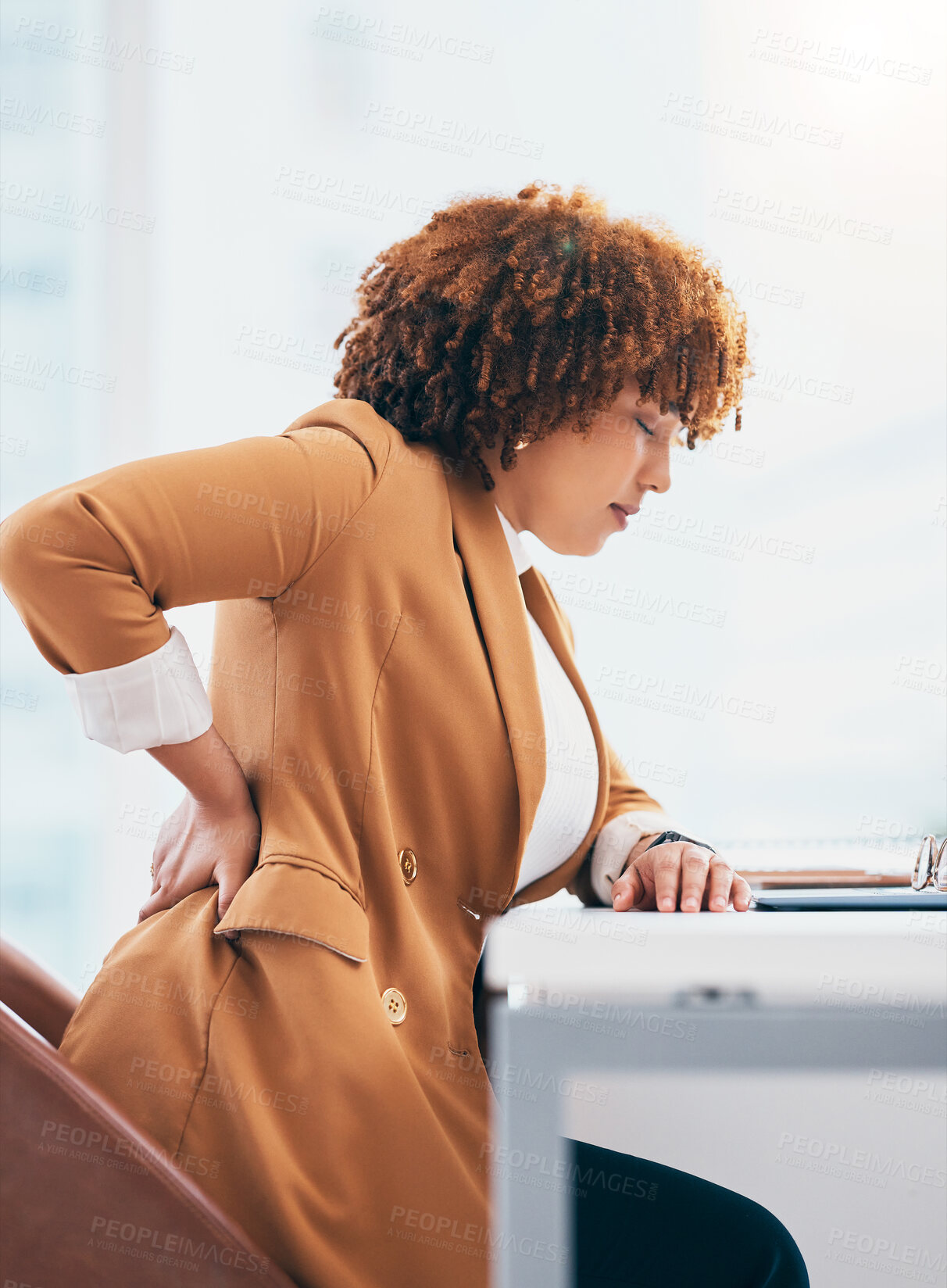 Buy stock photo Back pain, injury and black woman in office at desk with spine problem, backache and muscle tension. Stress, medical emergency and female worker massage body for accident, joint strain and pressure