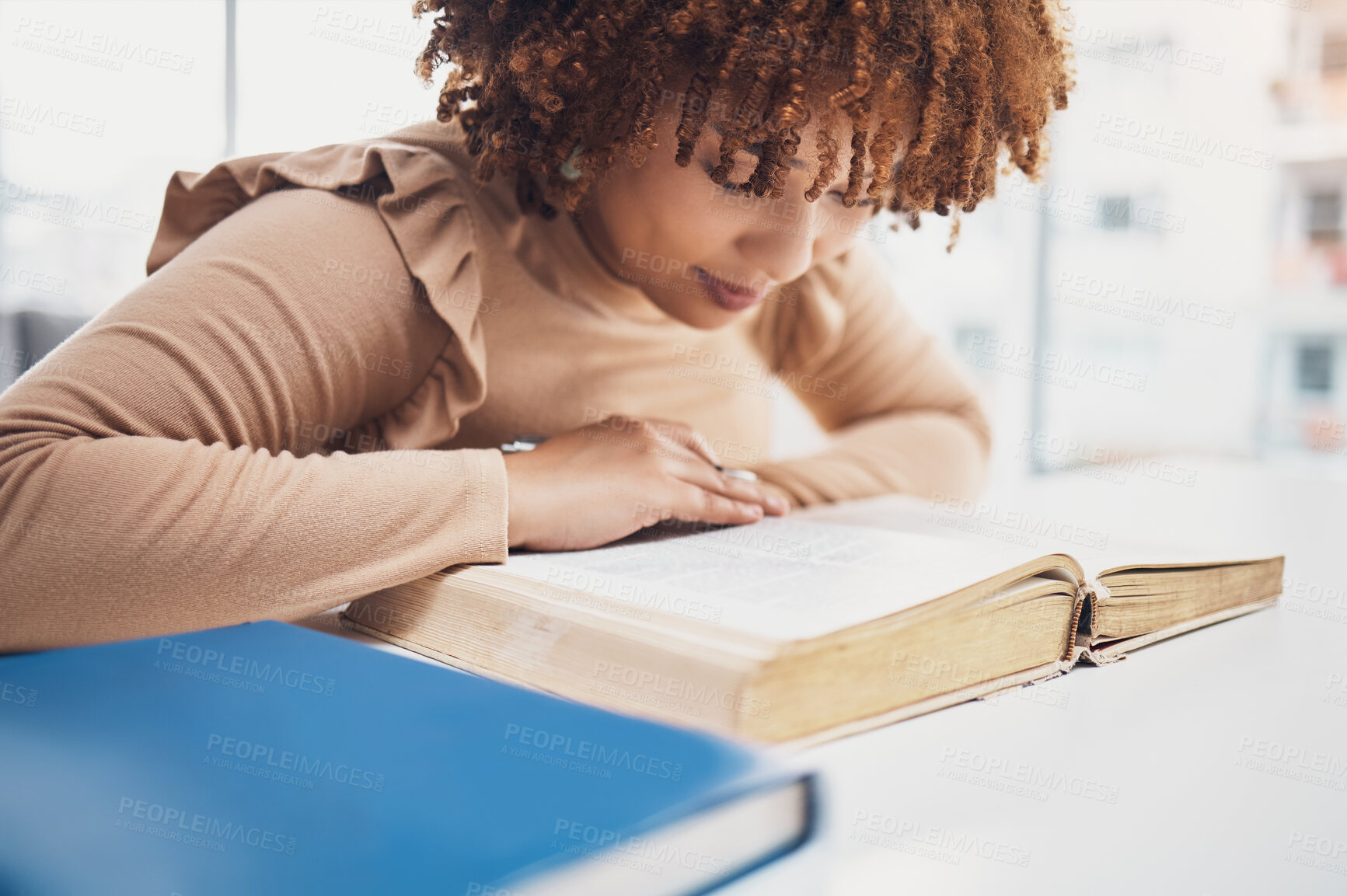 Buy stock photo Religion, faith and woman reading the bible for knowledge, learning or worship in a house. Believe, god and christian African female studying the holy book for spiritual wellness or hope in her home.