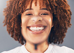 Happy, portrait and woman model with magnifying glass in a studio for a investigation or research. Happiness, smile and portrait of young African female with zoom lens or magnifier by gray background