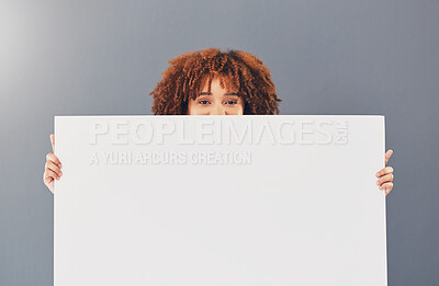 Buy stock photo Black woman, poster and advertising with mockup and marketing, product placement and portrait on studio background. Banner, white space and female with board, design and branding or promotion