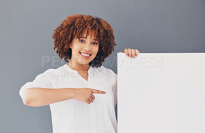Buy stock photo Black woman, board or poster with mockup and marketing, product placement and portrait on studio background. Banner, white space and female pointing with smile, advertising and branding and promotion
