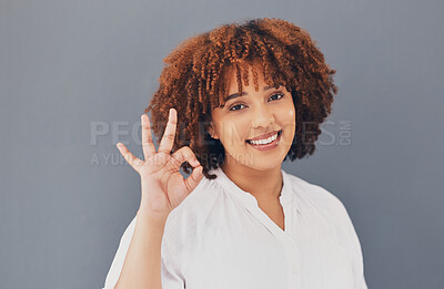 Buy stock photo Perfect, satisfaction and portrait of a black woman with a hand isolated on a grey studio background. Happy, okay and an African girl with an emoji sign for success, winning and support symbol