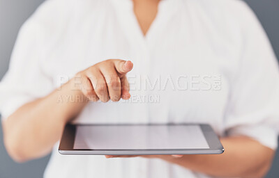 Buy stock photo Communication, app and hands of a woman with a tablet isolated on a studio background. Social media, contact and employee pointing a finger for connection to technology, internet and business