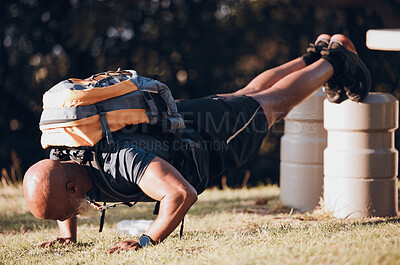 Buy stock photo Pushup, training and black man at a fitness bootcamp for exercise, workout and sports. Strong, bodybuilder and athlete doing a cardio challenge, physical activity and strength routine on a field