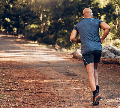 Back, black man and sports running in park, nature and forest for workout, training or exercise mockup. Sports male, runner and behind of outdoor fitness for energy, health or wellness on garden path