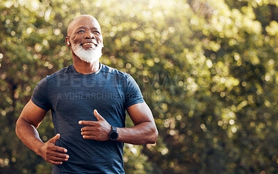Buy stock photo Happy black man running in park with music, smile and mockup in nature, garden and workout. Senior male, outdoor runner and motivation for fitness, energy and healthy exercise training with earphones