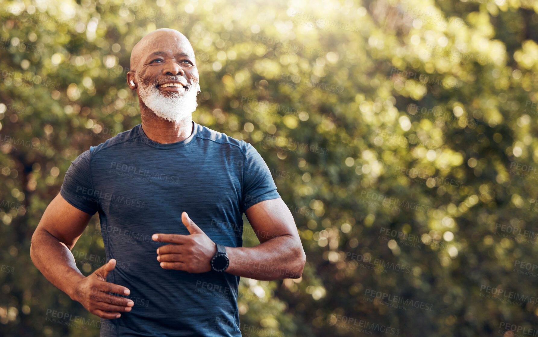 Buy stock photo Happy black man running in park with music, smile and mockup in nature, garden and workout. Senior male, outdoor runner and motivation for fitness, energy and healthy exercise training with earphones