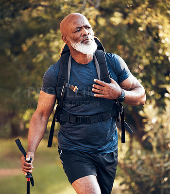 Buy stock photo Fitness, hiking and serious with black man in forest for freedom, health and sports training. Exercise, peace and wellness with senior hiker trekking in nature for travel, summer break and adventure