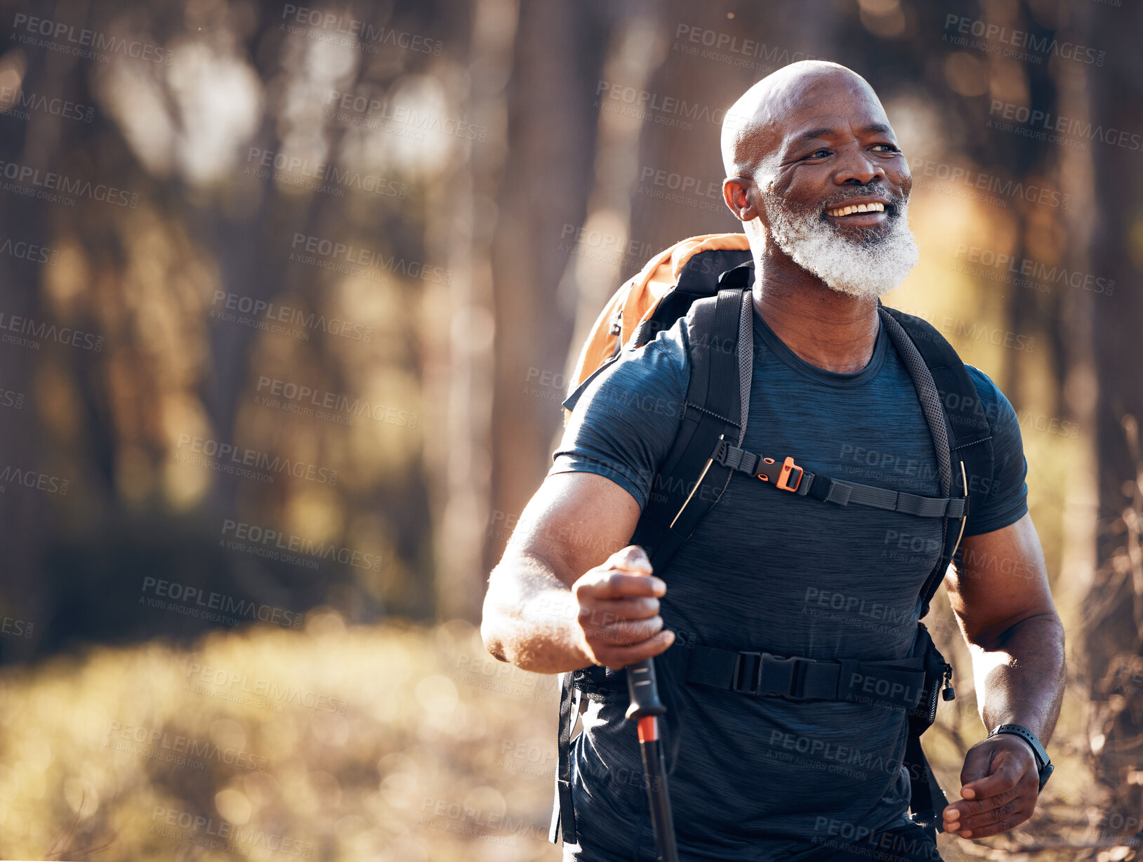 Buy stock photo Fitness, hiking and smile with black man in forest for freedom, health and sports training. Exercise, peace and wellness with senior hiker trekking in nature for travel, summer break and adventure