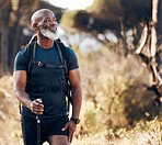 Hiking, black man and travel adventure in nature forest for trekking, fitness and cardio exercise. Senior person with backpack thinking and walking outdoor in woods for travel, health and wellness