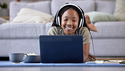 Buy stock photo Black woman, student and laptop with smile for elearning, education or entertainment by living room sofa at home. Happy African American female learner smiling on computer lying on lounge floor