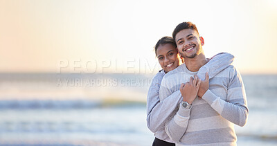 Buy stock photo Portrait, beach and mockup with a couple hugging outdoor in nature at sunset during summer vacation. Love, nature or seaside with a young man and woman sharing a hug on the coast by the ocean