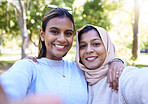 Women, muslim and friends selfie in park, nature and happiness for bonding on social network app. Happy gen z woman, profile picture and hug portrait in woods, outdoor and support together on travel