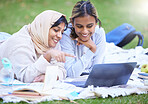 Muslim women, students or laptop pointing for learning, education or research in park, garden or college campus. Smile, happy or Islamic university friends on streaming technology or studying bonding
