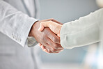 Business people, handshake and partnership in b2b, agreement or deal for collaboration, teamwork or unity. Hand of corporate employees shaking hands for meeting, greeting or success in solidarity