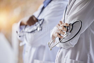 Buy stock photo Healthcare, stethoscope and hands of doctors with crossed arms for trust, medical care and consulting. Hospital mockup, wellness and health worker team for cardiology, insurance and medicare tools