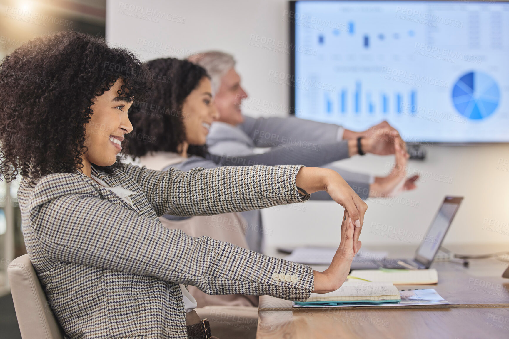 Buy stock photo Business people, desk and stretching arms at meeting for finance, budget and accounting presentation. Group, corporate team building and diversity with exercise for stress, muscle and healthy mindset