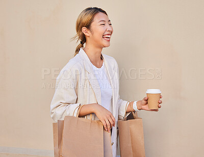 Buy stock photo Coffee, shopping and laughter with an asian woman customer walking outside for a sale or bargain. Smile, retail and comic with a happy young female shopper outdoor for consumerism at a mall