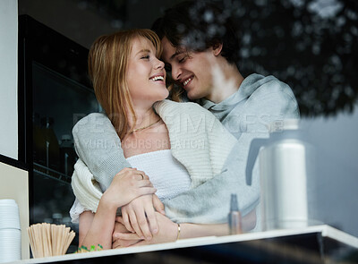 Buy stock photo Gen z, couple and kitchen window on date together with love, care and hug while laughing. College student, relax and happiness of a teen man and girl with a happy smile from teenager relationship