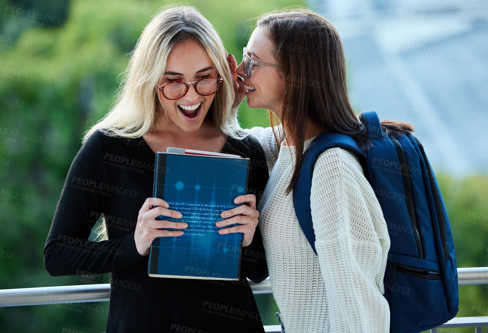 Buy stock photo Women students, whisper secret and friends with smile, wow and gossip at college with chat, bonding and excited. Gen z girl, studying and surprise face for story, education and university experience