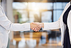 Handshake, partnership and b2b with business women in agreement of a deal in the office for company growth. Welcome, teamwork or meeting with a female manager and employee shaking hands at work