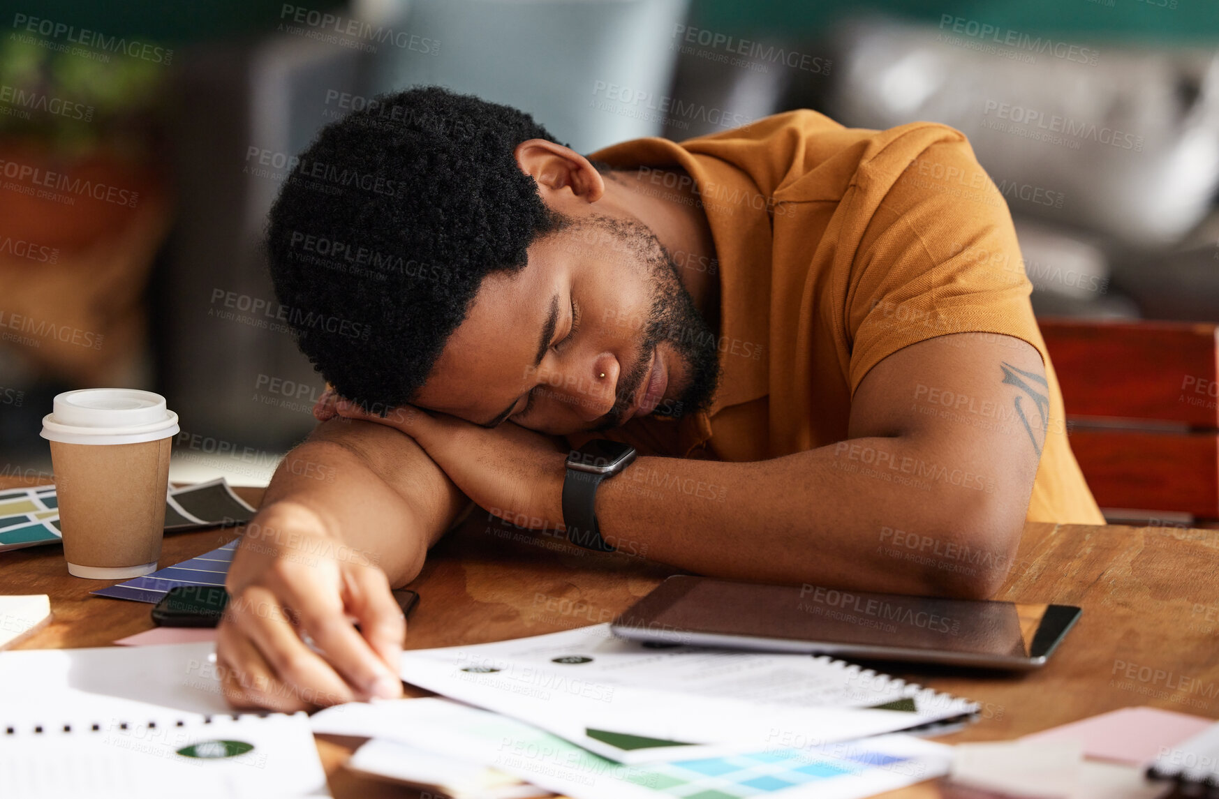 Buy stock photo Tired, exhausted and man sleeping in the office while working on a creative advertising project. Burnout, company and professional African male employee taking nap while planning report in workplace.