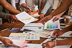 Creative business people, hands and color palette in meeting, planning or brainstorming design strategy at office. Hand of group interior designers in teamwork, project plan or swatches for startup