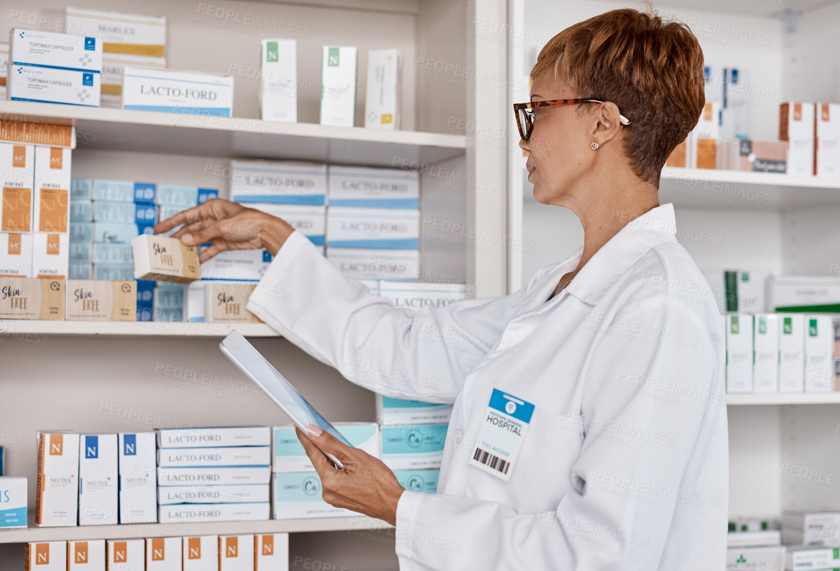 Buy stock photo Pharmacy woman, tablet and medicine shelf to check inventory and product information search. Pharmacist person with Pharma app in clinic or shop for pharmaceutical, medical and health search or order