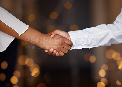 Buy stock photo Partnership, deal and business people shaking hands in a office with a bokeh background. Welcome, greeting and team doing a handshake gesture for connection, agreement or onboarding in the workplace.