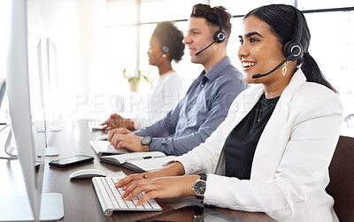 Buy stock photo Woman, call center and computer typing and consulting in telemarketing, customer service or support at office. Happy female consultant talking on mic sitting by desktop PC in contact us for sales
