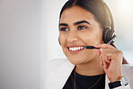 Happy woman, call center and face with headset mic consulting in telemarketing, customer service or support at office. Friendly female consultant or agent with smile by computer in contact us sales