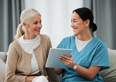 Buy stock photo Asian woman nurse, senior patient and tablet for consulting, healthcare and report for medical help. Japanese doctor, women and digital touchscreen ui for consultation room, happy or smile for advice