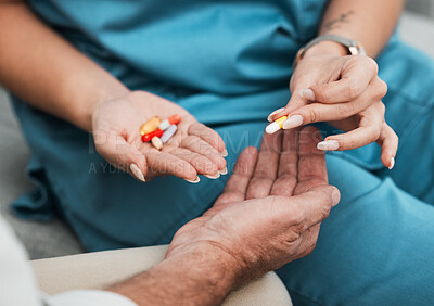 Buy stock photo Pills, senior medication and man hands with a nurse and caregiver giving medicine at clinic. Retirement, nursing home and care of a healthcare, wellness and hospital worker with prescription drugs