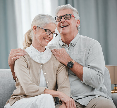 Buy stock photo Laughing, love or funny old couple hugging on house living room sofa together enjoying quality time. Smile, peace or happy mature man bonding with a supportive senior woman in retirement at home