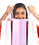 Retail, Indian woman portrait and shopping bag from discount sale or fashion promotion. Happy customer, gen z female model and clothes product deal with paper bags after designer sales in studio