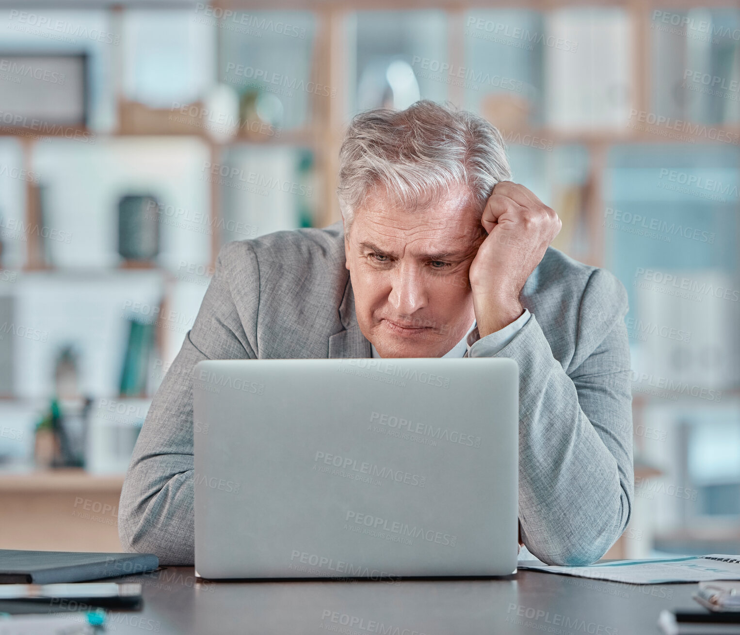 Buy stock photo Stress, confused and mature businessman with a laptop, reading an email and tired from a deadline. Anxiety, burnout and elderly corporate worker with bad news, glitch or problem with a computer