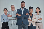 Leadership, team and business people with crossed arms in a studio with confidence, unity and teamwork. Collaboration, corporate and portrait of a group of employees standing by a gray background.