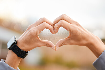 Buy stock photo Heart hands, outdoor fitness and health for smartwatch exercise, running or wellness closeup. Cardiology, exercise and healthy person with love sign and smart watch in park or nature for care emoji