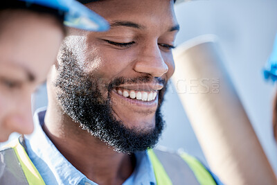 Buy stock photo Black man, architect and smile in construction for project planning, teamwork or leadership on site. Happy African American male contractor, engineer or builder smiling for industrial architecture