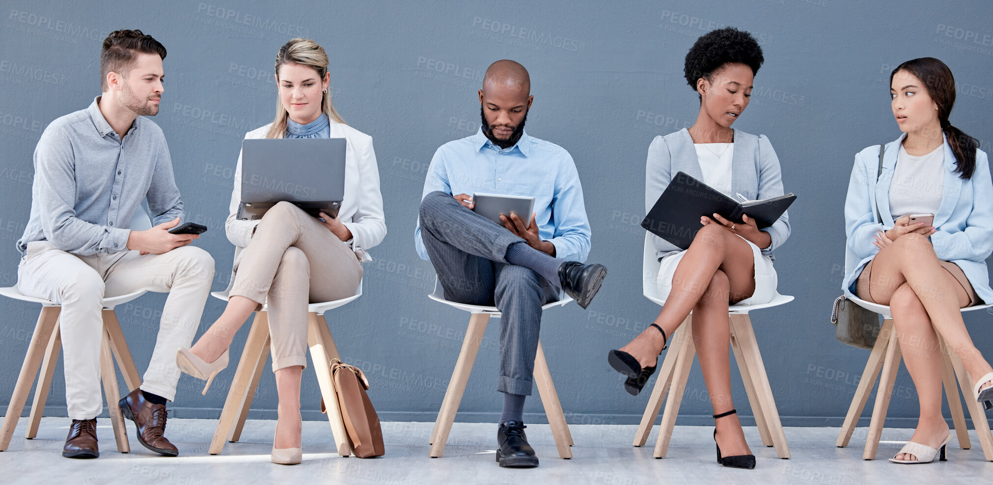 Buy stock photo Technology, recruitment and a group of business people waiting in line for their meeting with human resources. Interview, hiring or diversity with man and woman candidates sitting in a row at hr