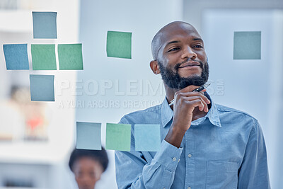 Buy stock photo Black man, writing and thinking in planning schedule on glass board for brainstorming tasks at office. African male wondering in thought for project plan, idea or sticky note for company strategy