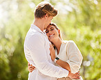 Nature, love and couple hug for happy, quality time and bonding on weekend, vacation and holiday together. Dating, summer and young man and woman hugging, relax and kiss for romantic embrace in park