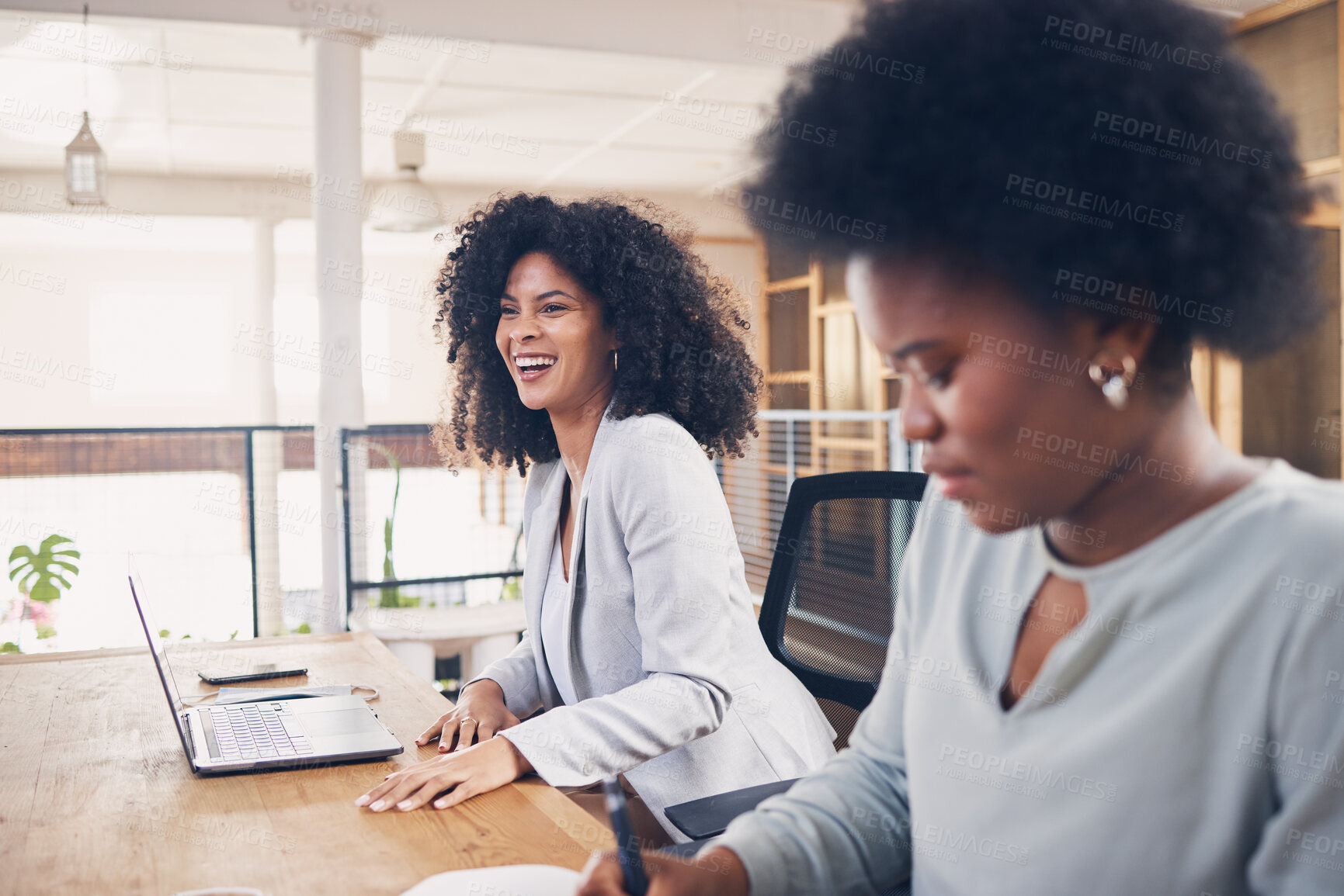 Buy stock photo Black woman laughing in a business meeting for funny ideas, planning online and startup teamwork in office workspace. Happy professional people working on laptop for collaboration and career workflow